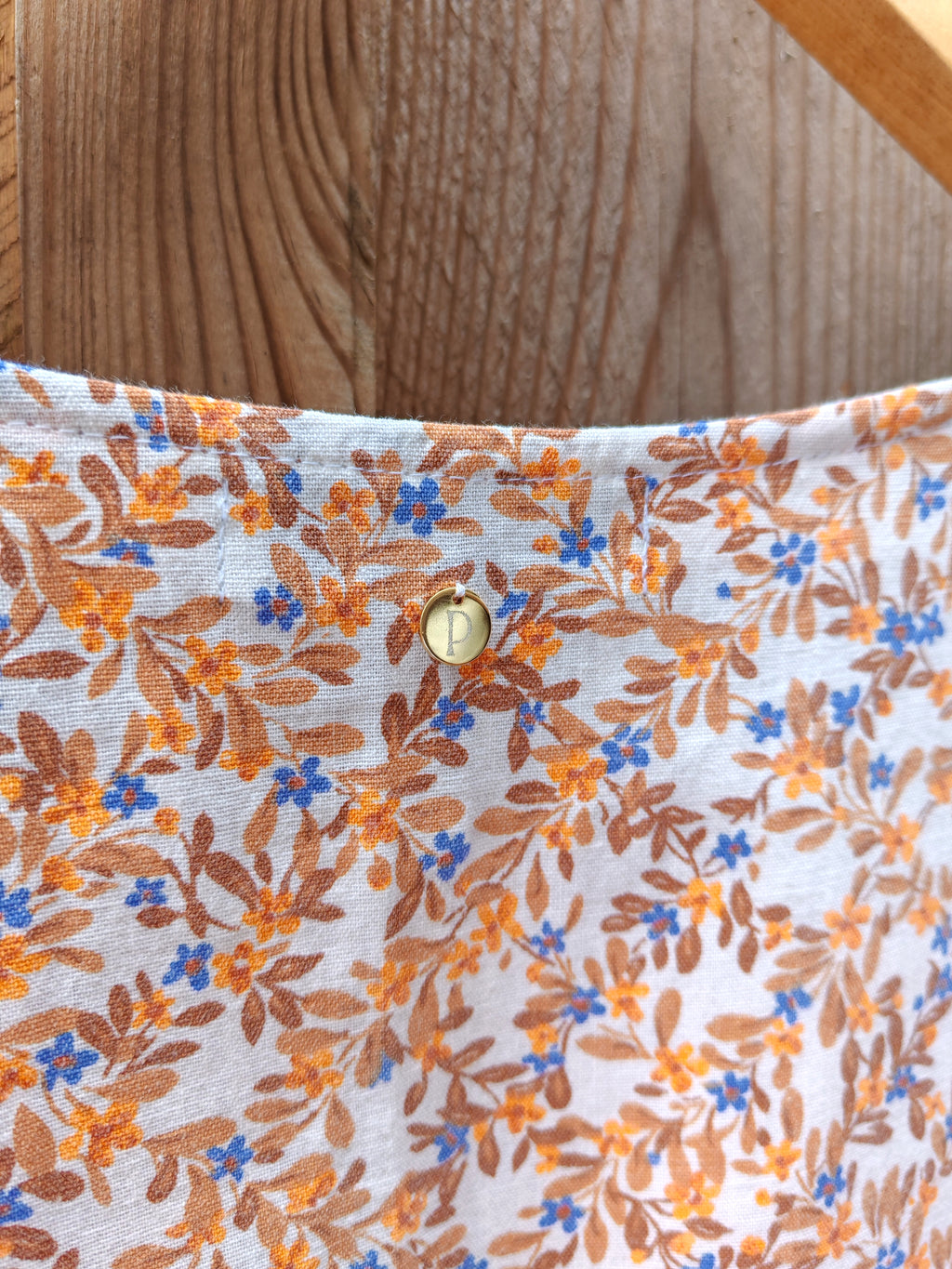 Blouse Cyclamen – Petites fleurs orange et bleu